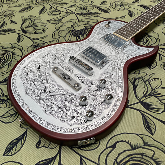 Vintage electric guitar with hand-etched aluminum panel guitars, the ultimate look for rock enthusiasts guitarra