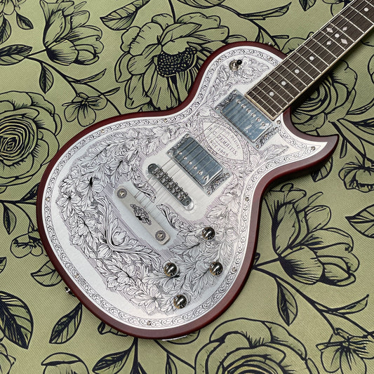 Vintage electric guitar with hand-etched aluminum panel guitars, the ultimate look for rock enthusiasts guitarra
