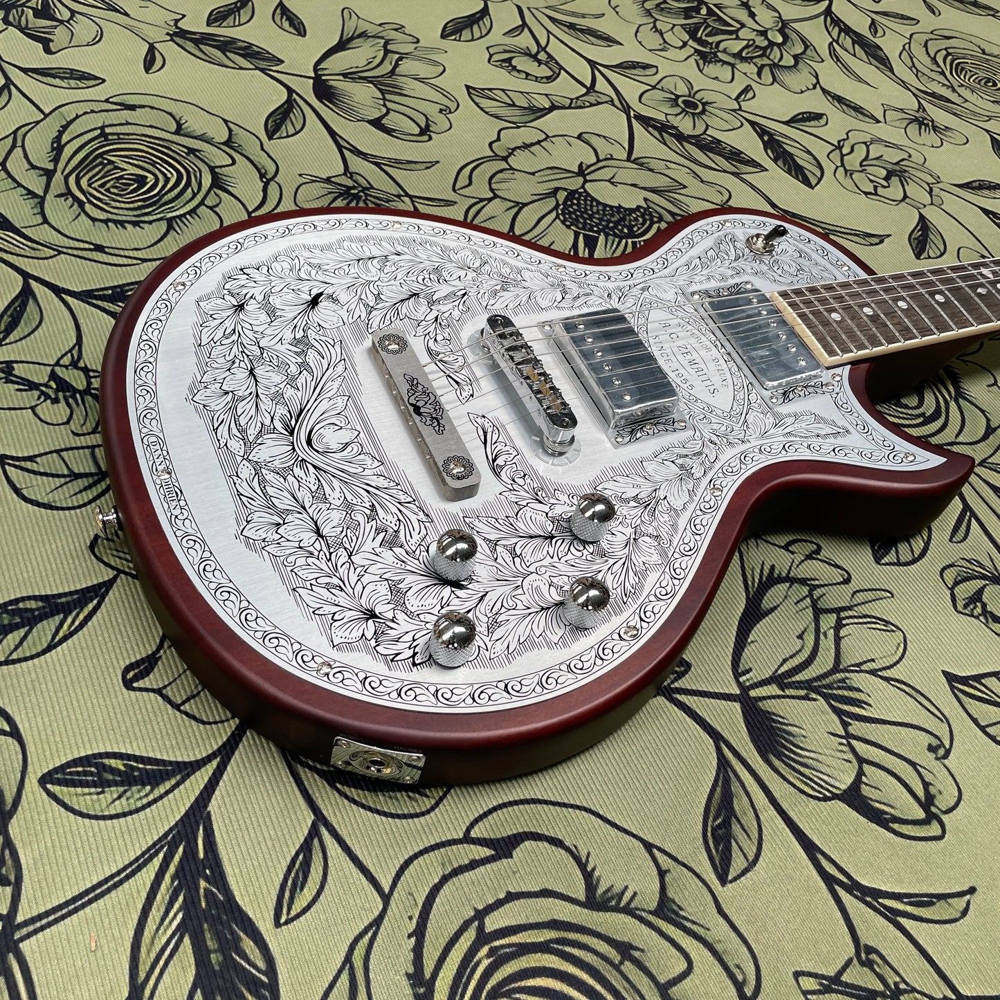 Vintage electric guitar with hand-etched aluminum panel guitars, the ultimate look for rock enthusiasts guitarra